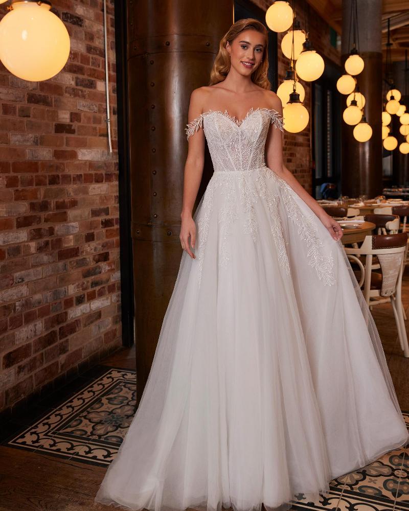 La22250 sparkly off the shoulder wedding dress with sleeves and a line silhouette1